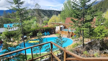 Seasonal outdoor pool, open 9:00 AM to 9:00 PM, pool loungers