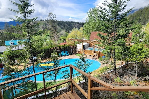 Seasonal outdoor pool, open 9:00 AM to 9:00 PM, pool loungers