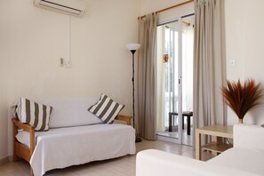 Superior Apartment (105) | Living area | Flat-screen TV - Constantia Gardens Apartments (Paphos)