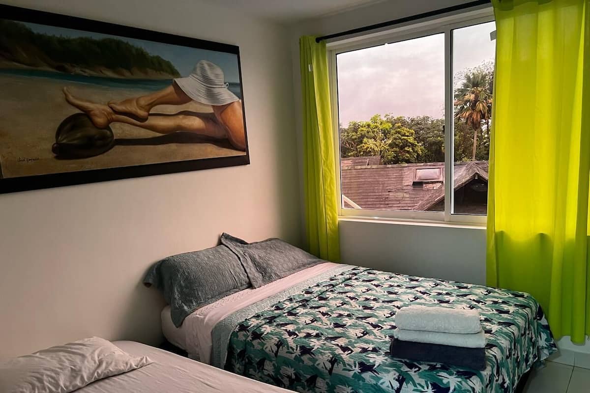 Standard Apartment, Multiple Beds, Garden View | 5 bedrooms, down comforters, in-room safe, iron/ironing board