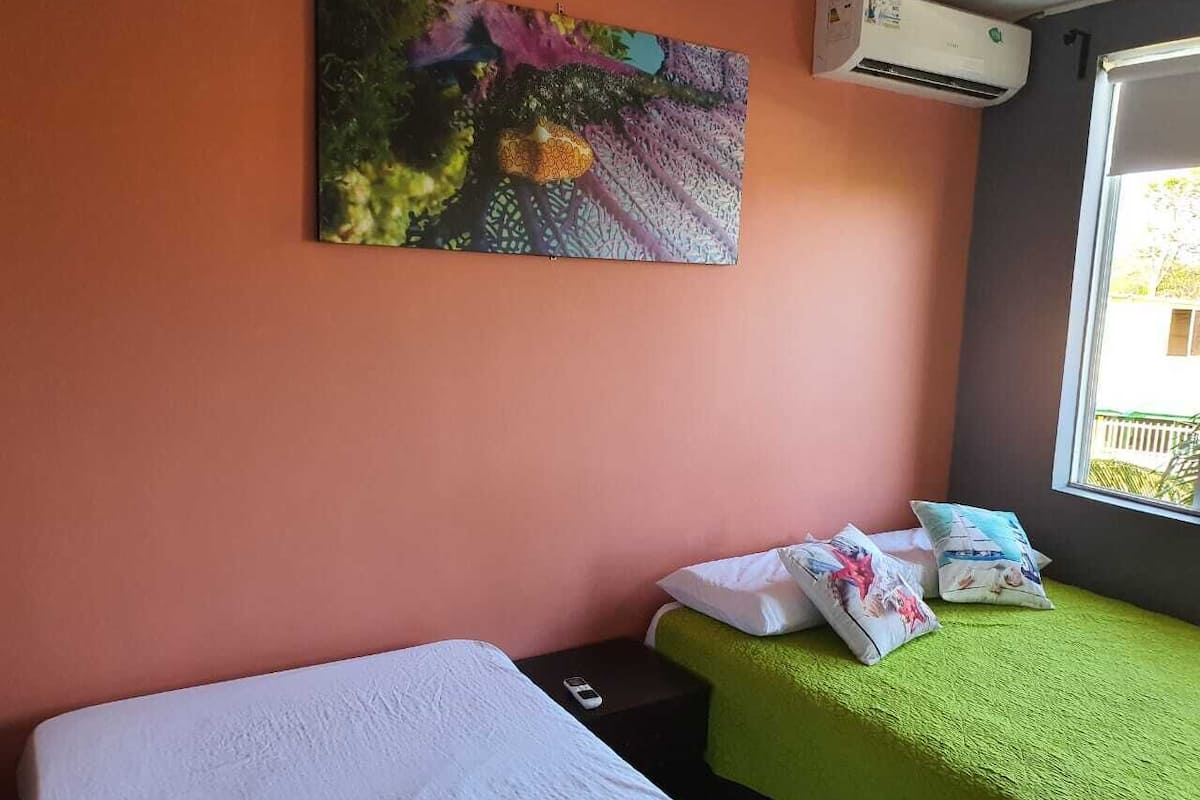 superior apartment, multiple beds, garden view | down duvets, in-room safe, iron/ironing board, bed sheets