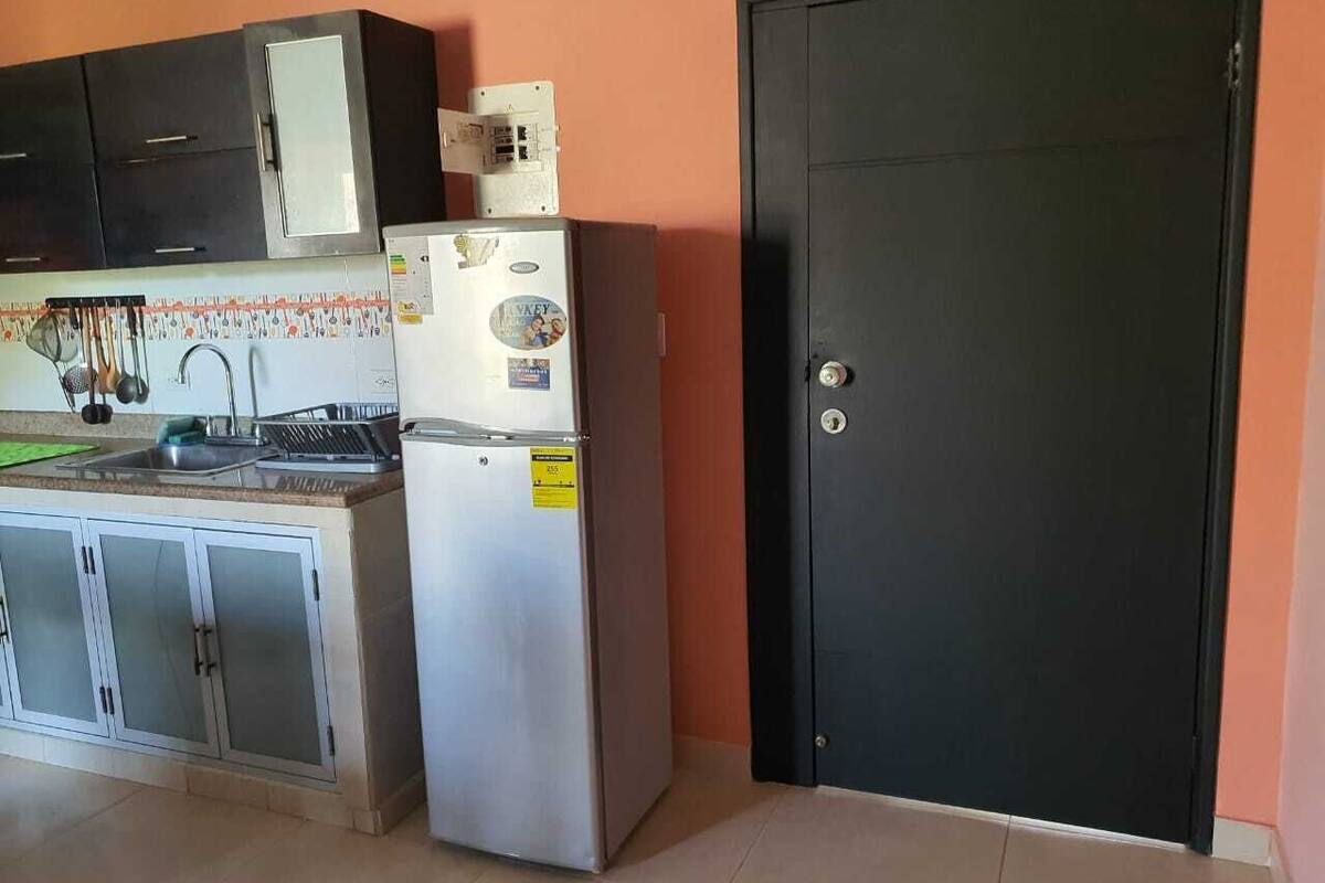 superior apartment, multiple beds, garden view | private kitchenette | coffee/tea maker