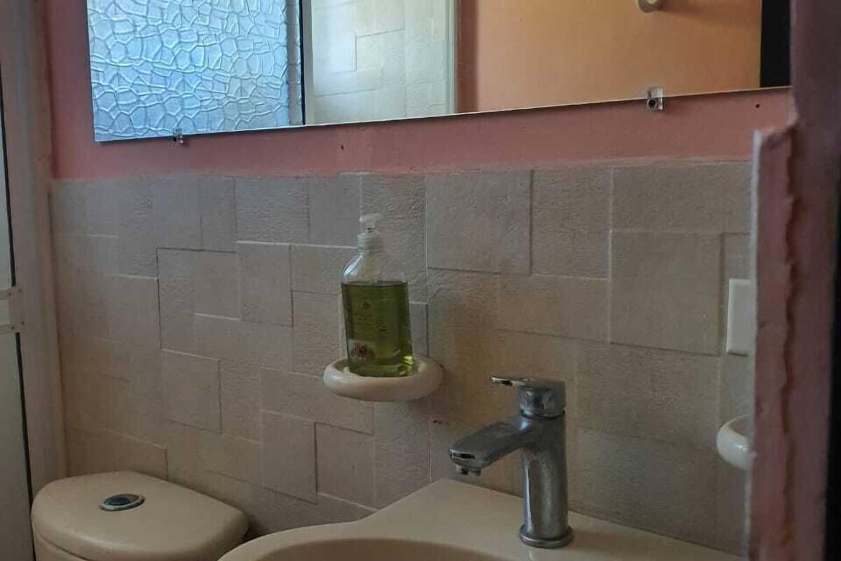 superior apartment, multiple beds, garden view | bathroom | shower, free toiletries, towels, soap