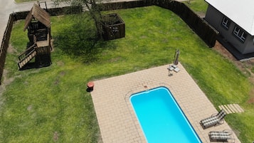 Outdoor pool, pool umbrellas, pool loungers