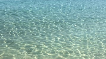 Beach nearby, white sand, sun-loungers, beach umbrellas