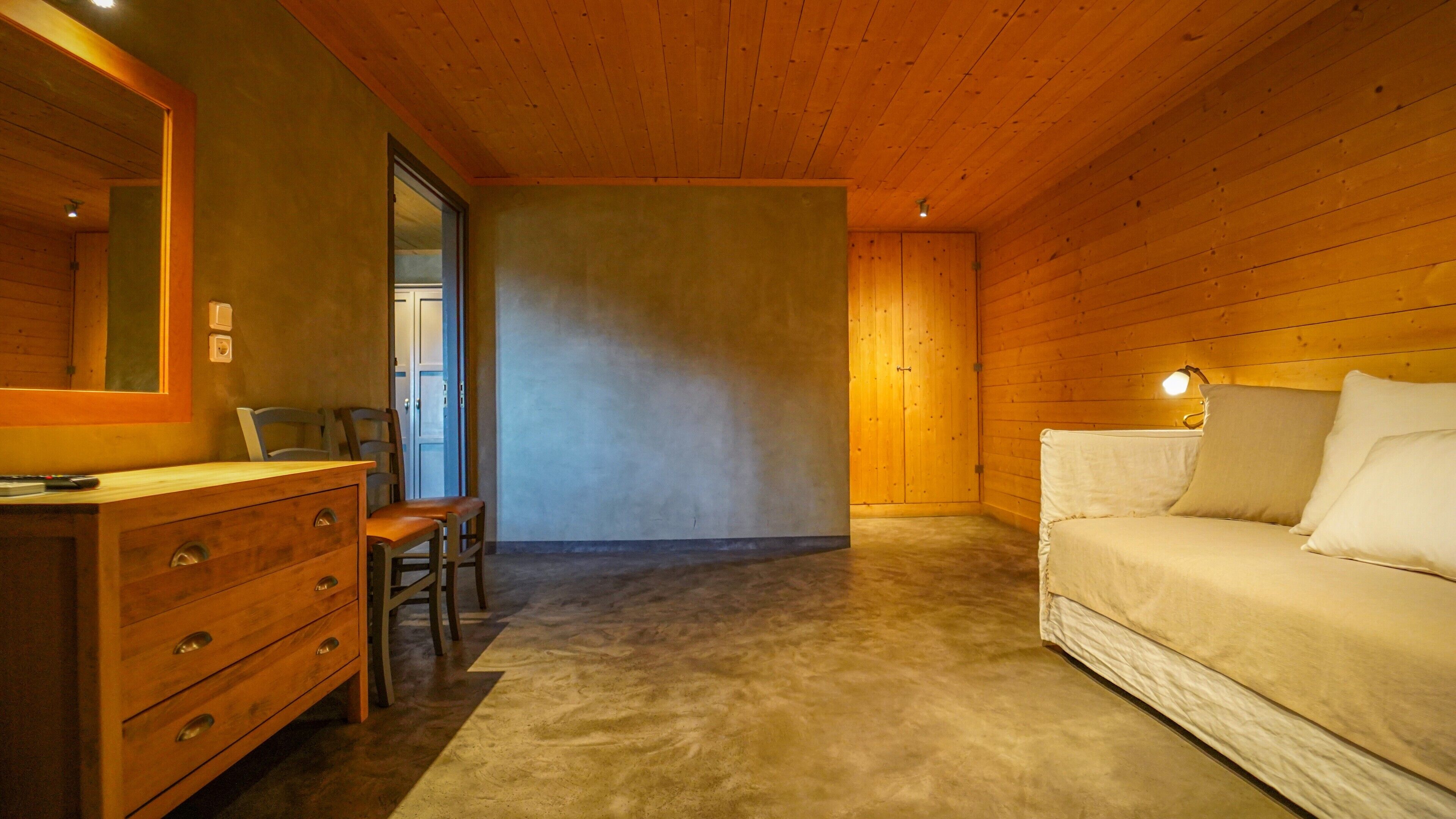 superior suite, sea view | living area | flat-screen tv