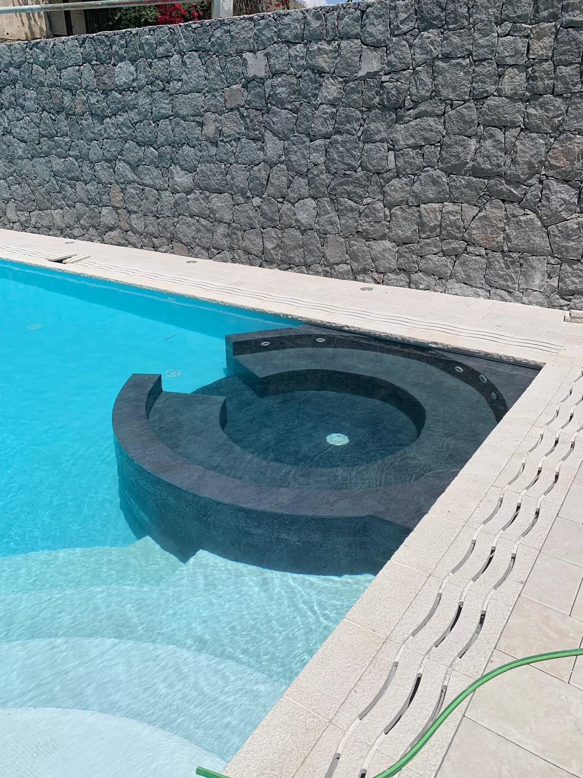 Seasonal outdoor pool, pool umbrellas, pool loungers