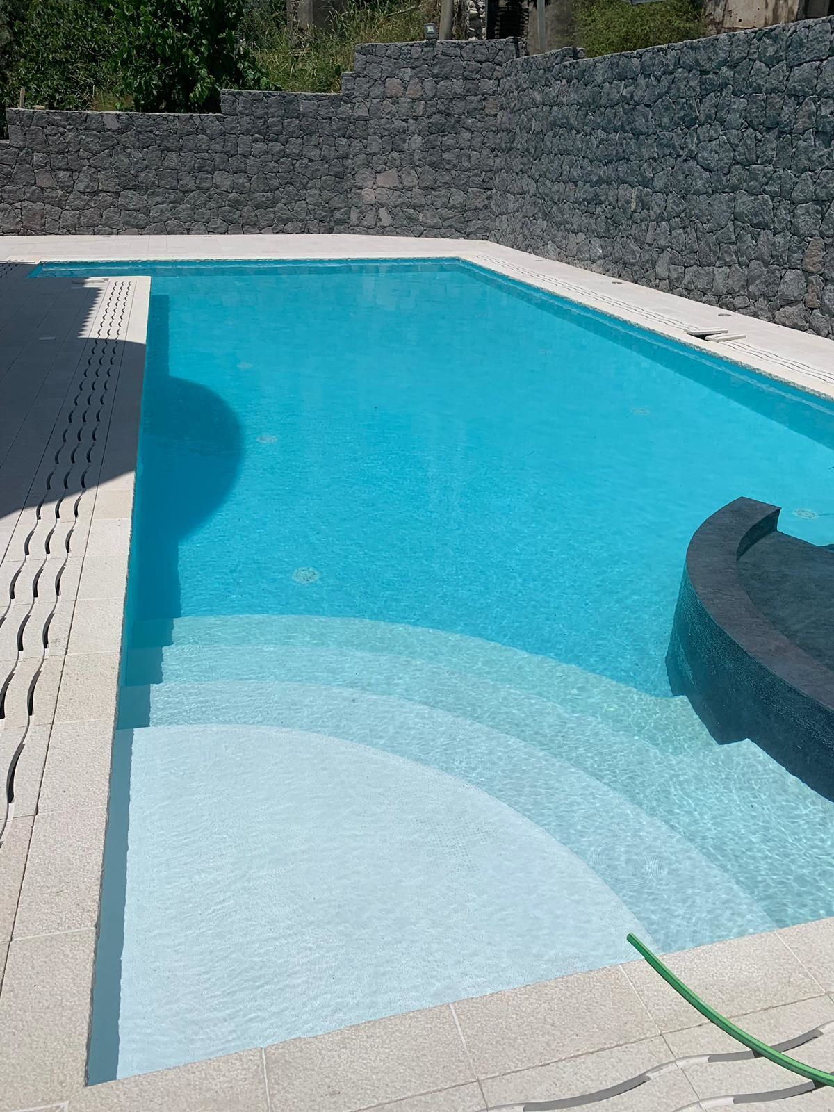 Seasonal outdoor pool, pool umbrellas, pool loungers