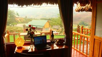 Deluxe Bungalow, 1 Queen Bed, Mountain View | Terrace/patio