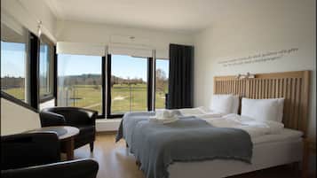Deluxe Double Room, 1 Queen Bed, Golf View | Blackout drapes, bed sheets