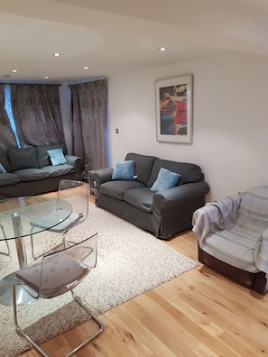 Apartment, 3 Bedrooms | Living area