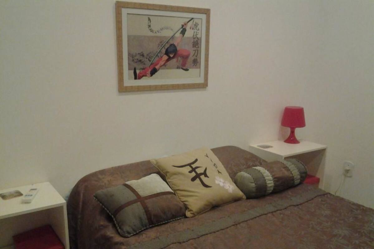 Habitación doble Deluxe, 1 cama Queen size, vista al patio | Wifi gratis, ropa de cama y acceso para silla de ruedas