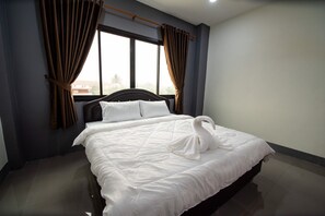 Blackout curtains, free WiFi, bed sheets - Maneetham Residence (Chiang Rai)