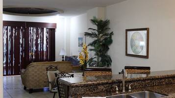 Condo, 1 Bedroom | Living area | Flat-screen TV, DVD player