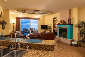 Condo, 2 Bedrooms | Living area | Flat-screen TV