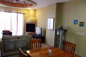 Appart'hôtel, 1 chambre | Coin séjour | Télévision, lecteur de DVD