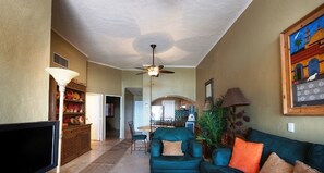 Condo, 2 Bedrooms | Living area | Flat-screen TV, DVD player