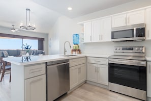 Condo, 2 Bedrooms, Sea View | Private kitchen | Fridge, microwave, stovetop, cookware/dishes/utensils