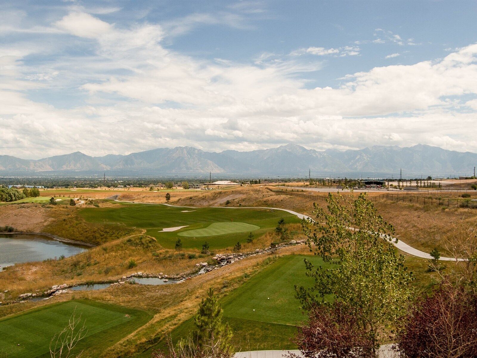 ENJOY NEARBY GOLF AND BREATHTAKING PANORAMIC MOUNTAIN VIEWS OF THE WASATCH MTNS