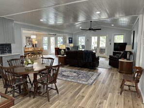 Open living area opens to porch with incredible lake views!