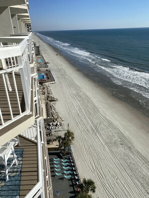 On the beach, sun-loungers, beach towels