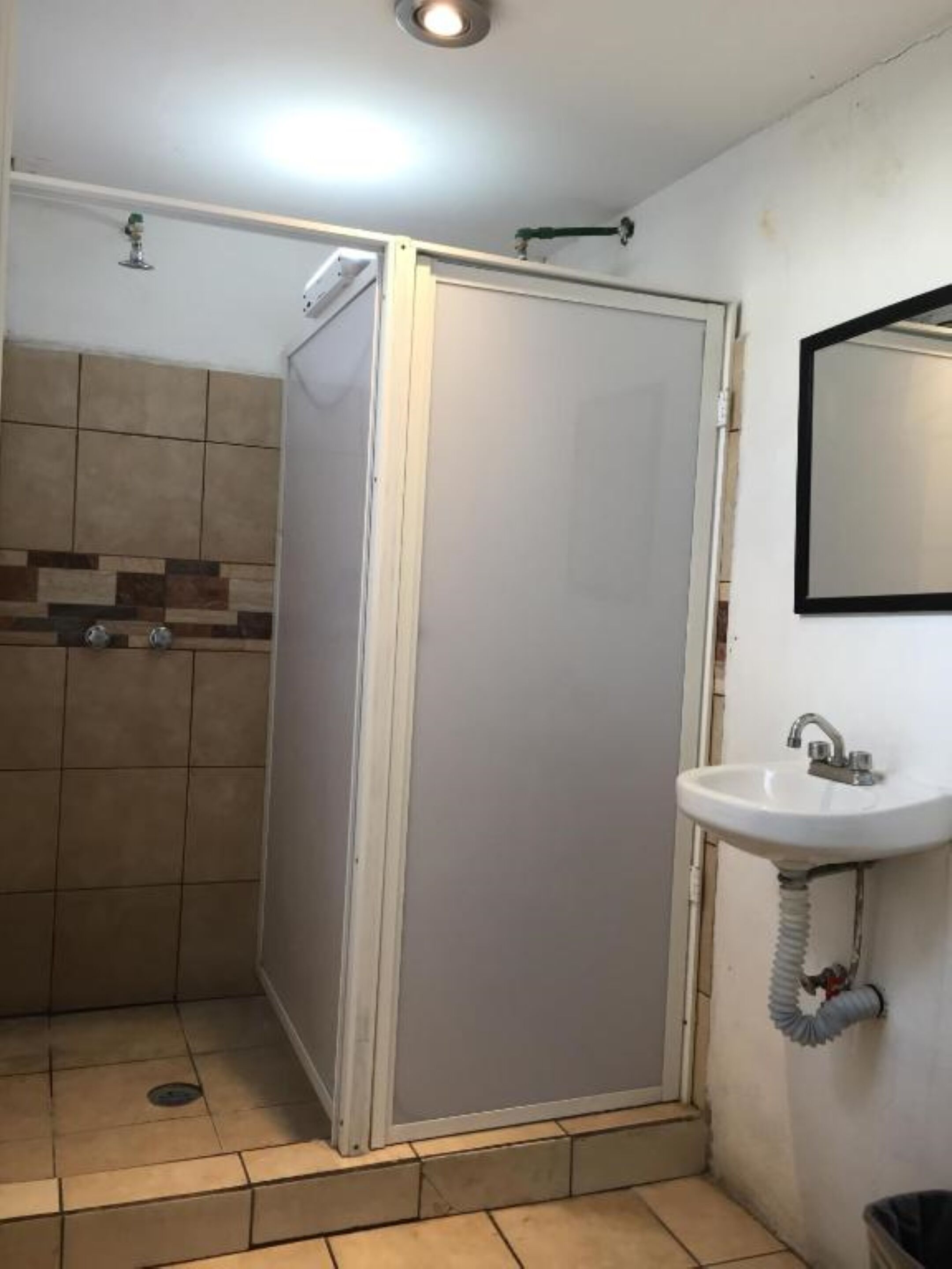 economy double room, 1 double bed, shared bathroom | bathroom | shower, towels, soap, shampoo