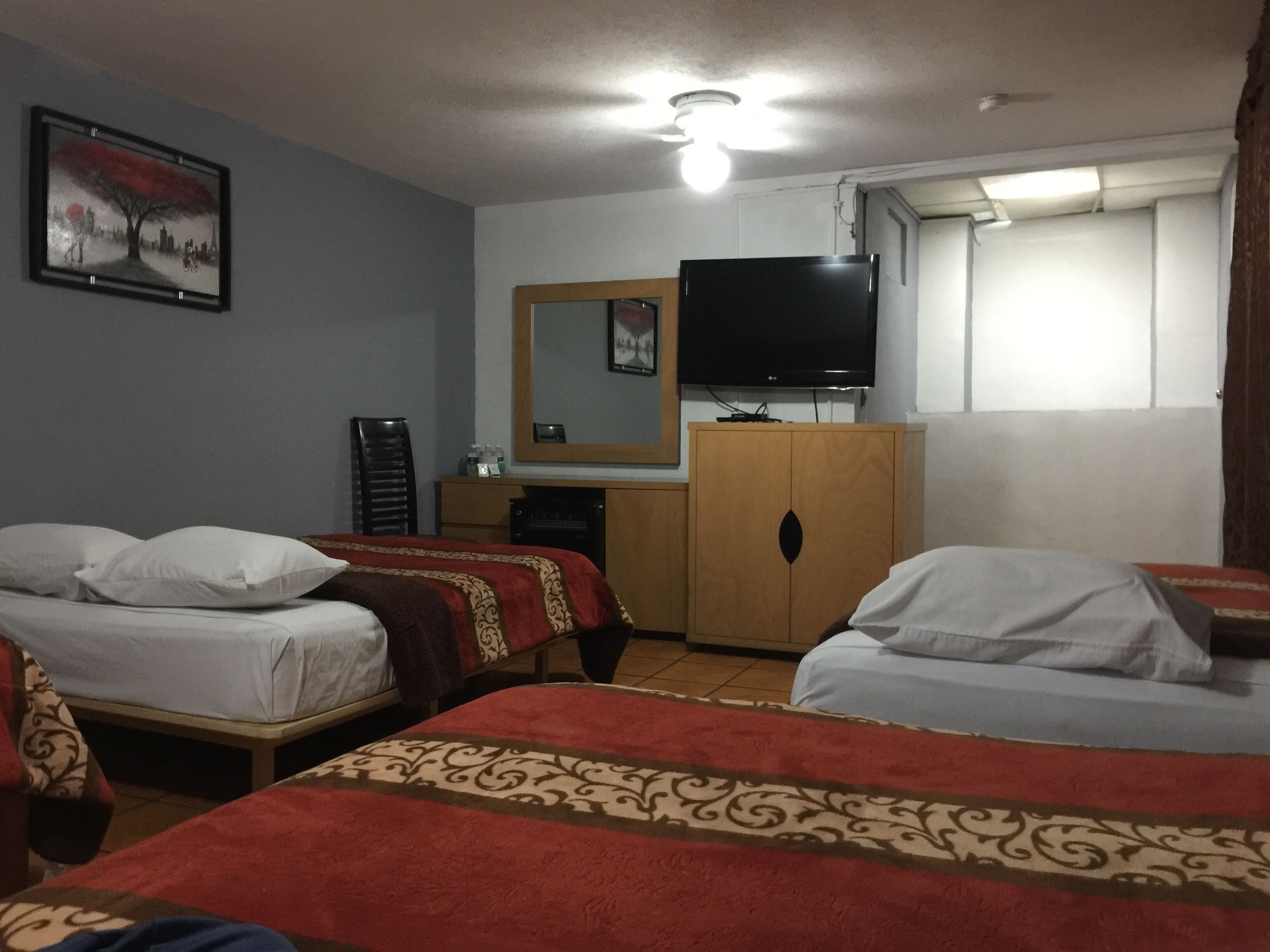 family room (7) | blackout curtains, iron/ironing board, free wifi, bed sheets