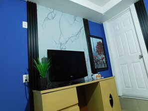 Rideaux occultants, fer et planche à repasser, Wi-Fi gratuit