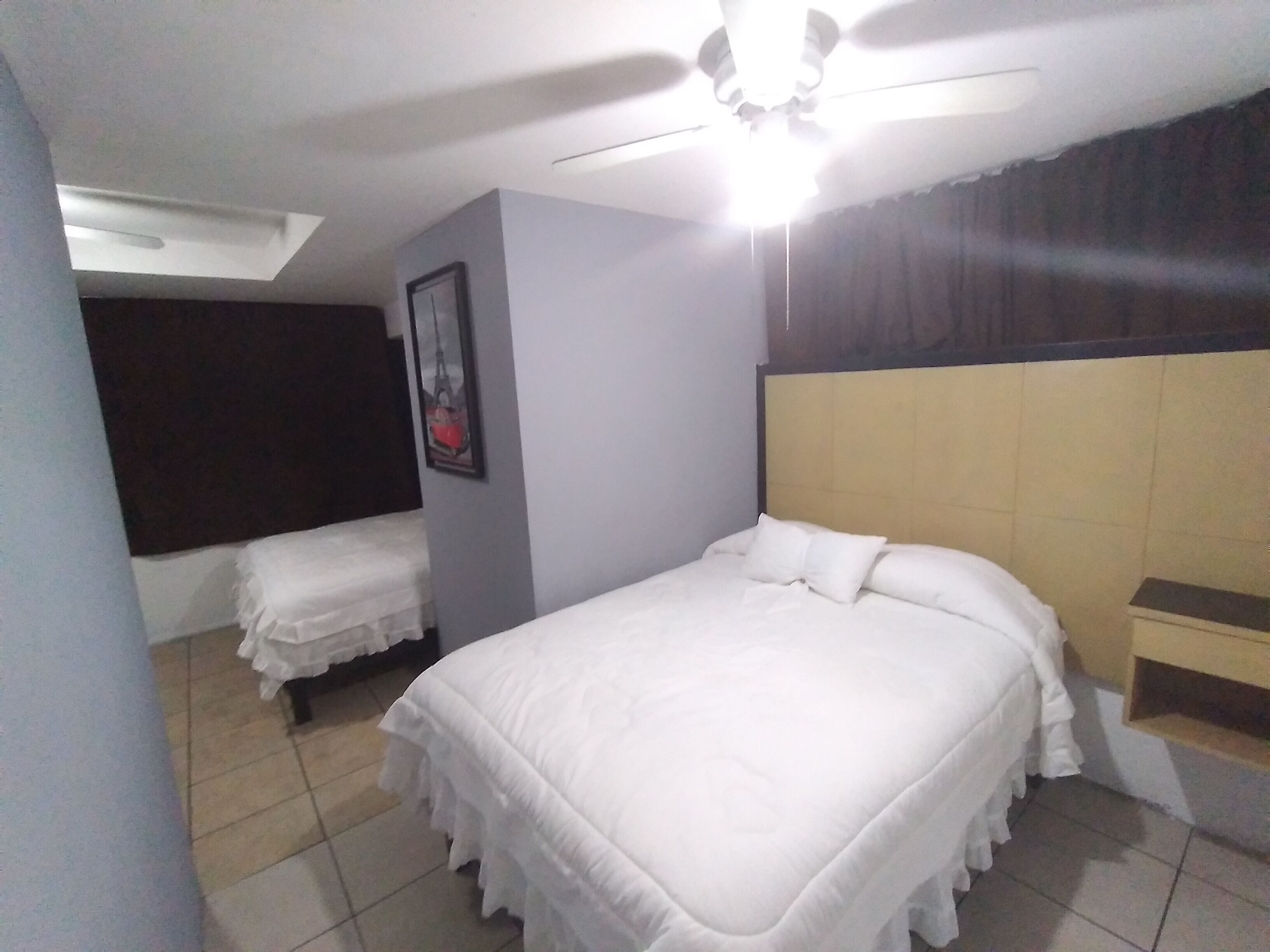 basic quadruple room | blackout curtains, iron/ironing board, free wifi, bed sheets