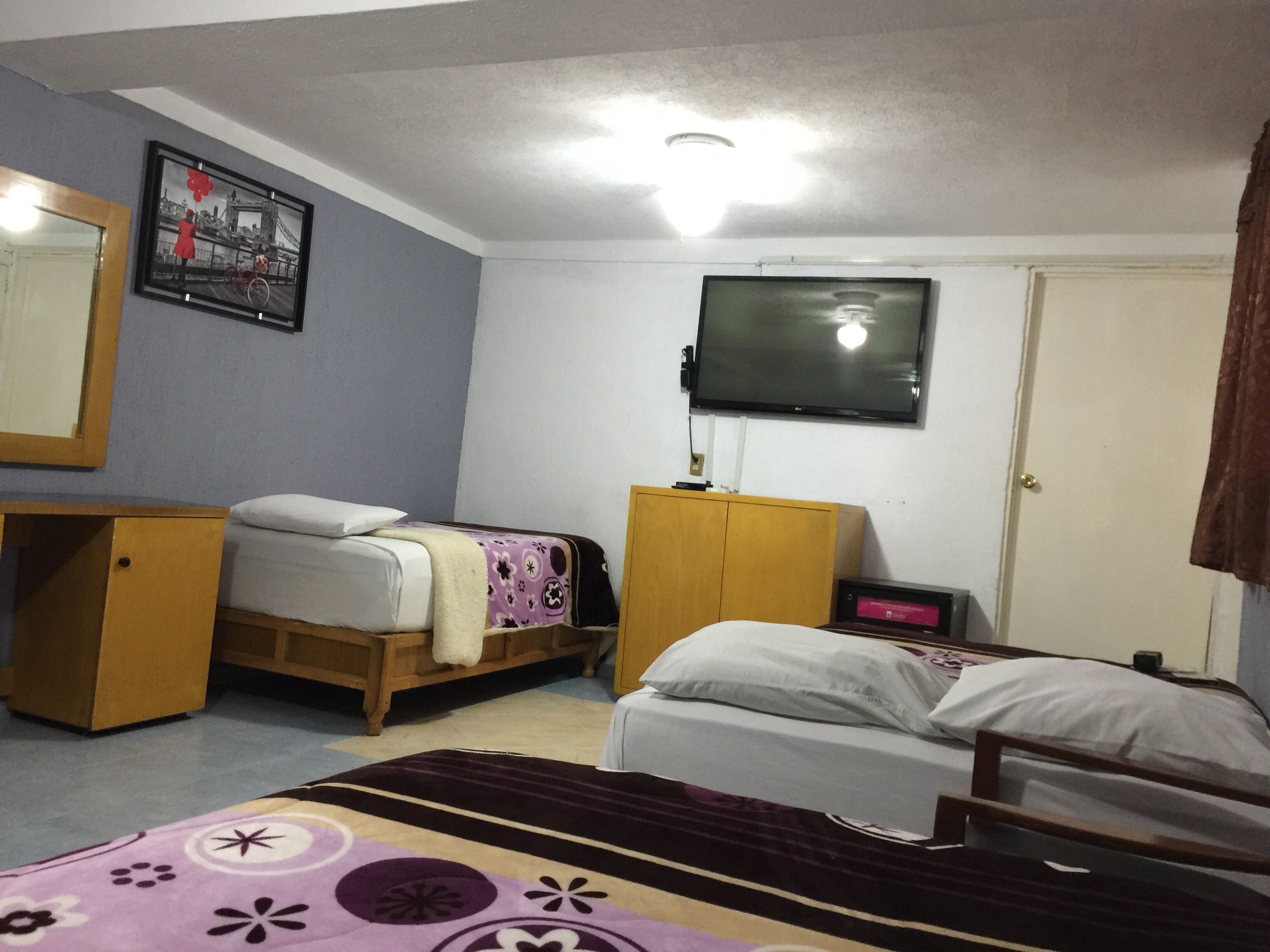 family room (7) | blackout curtains, iron/ironing board, free wifi, bed sheets