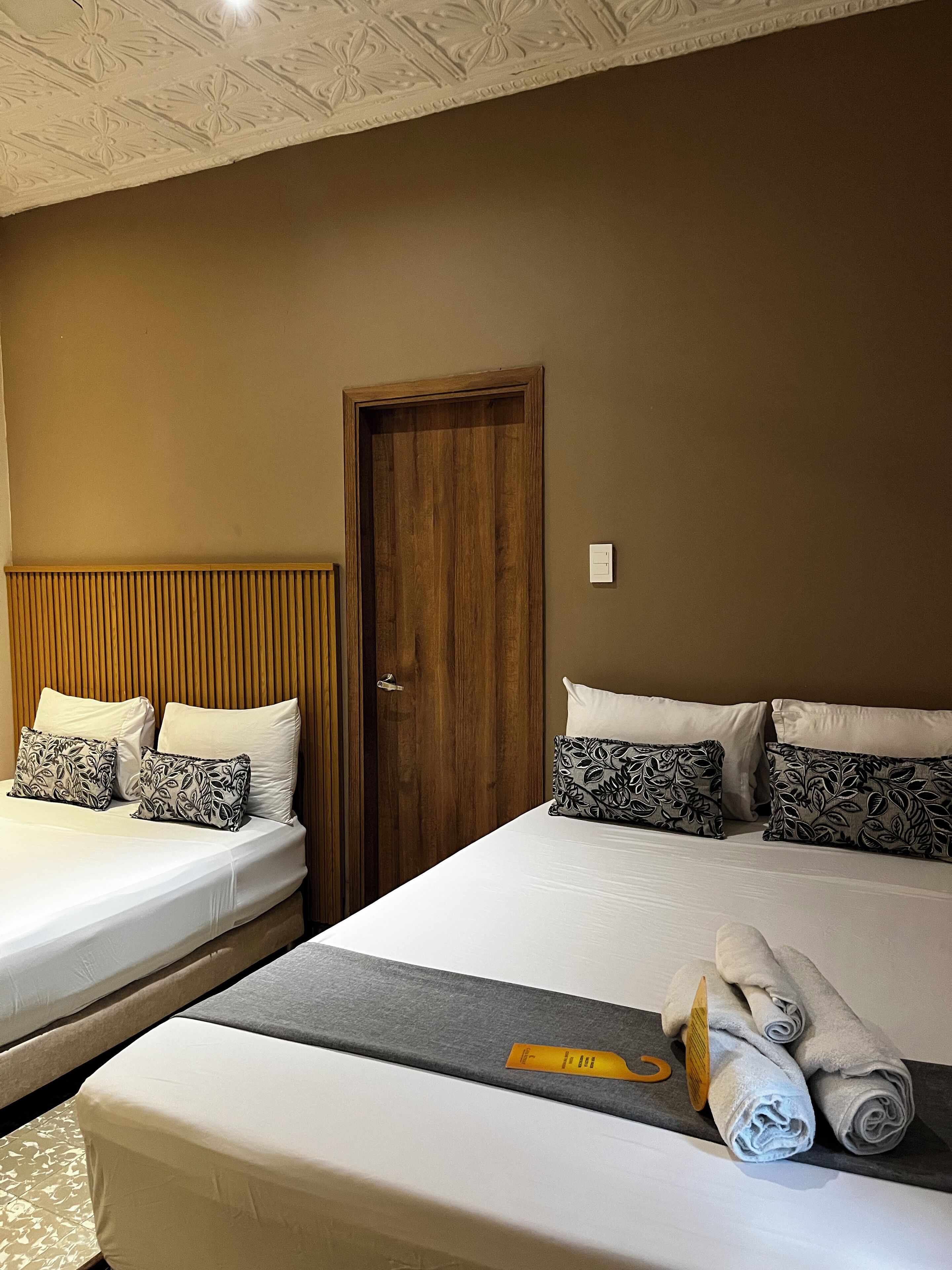 Superior Quadruple Room, Multiple Beds, Air conditioning | Hypo-allergenic bedding, minibar, in-room safe, blackout curtains