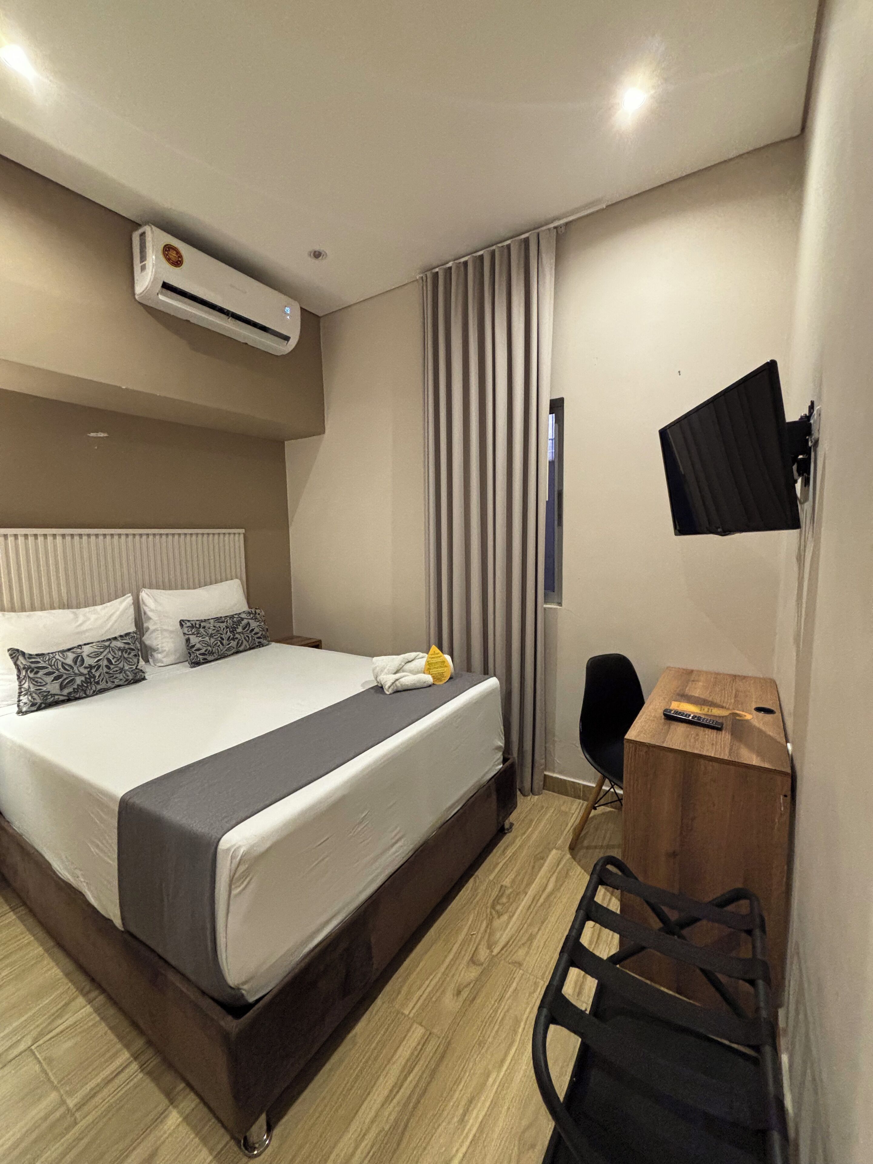 Hypo-allergenic bedding, in-room safe, blackout curtains