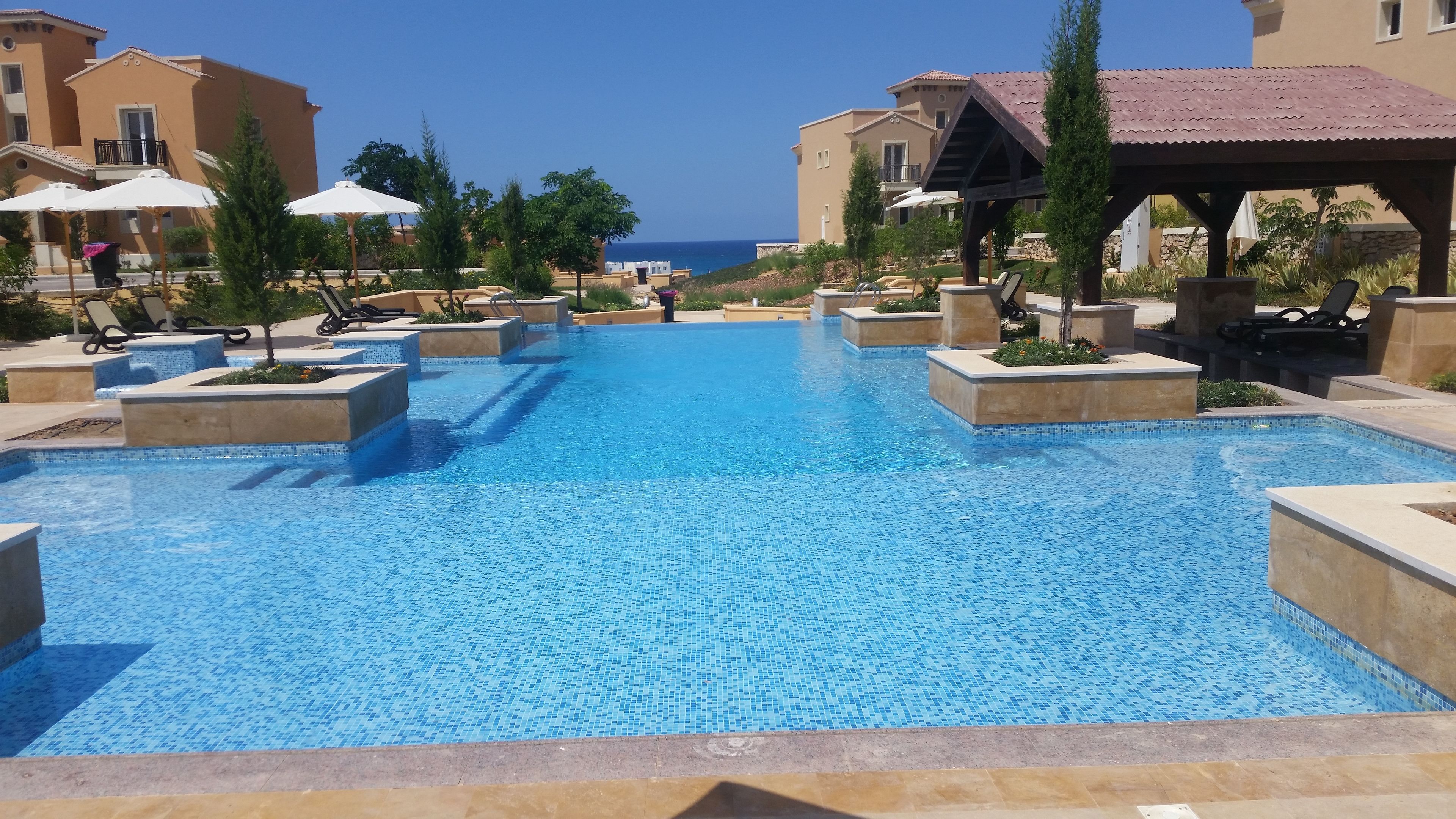 5 outdoor pools, pool umbrellas, pool loungers