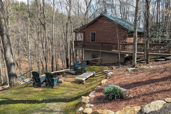 fireside seating area overlooks creek - you'll want s'more of this