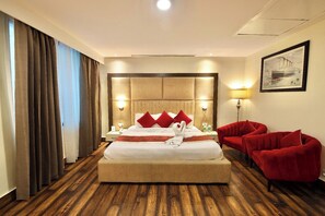 Presidential Suite, City View | Living area | 42-inch LED TV with cable channels