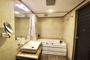 Deep-soaking bathtub, free toiletries, hair dryer, bathrobes