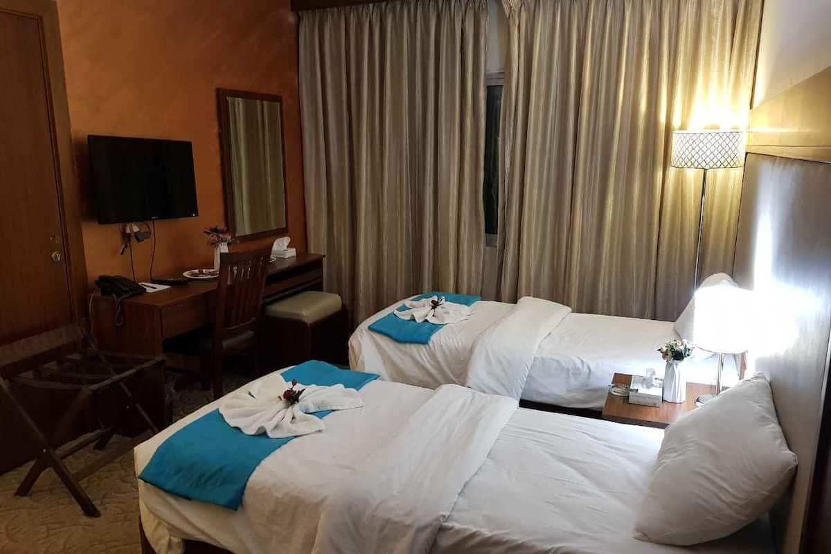 In-room safe, iron/ironing board, cribs (free)
