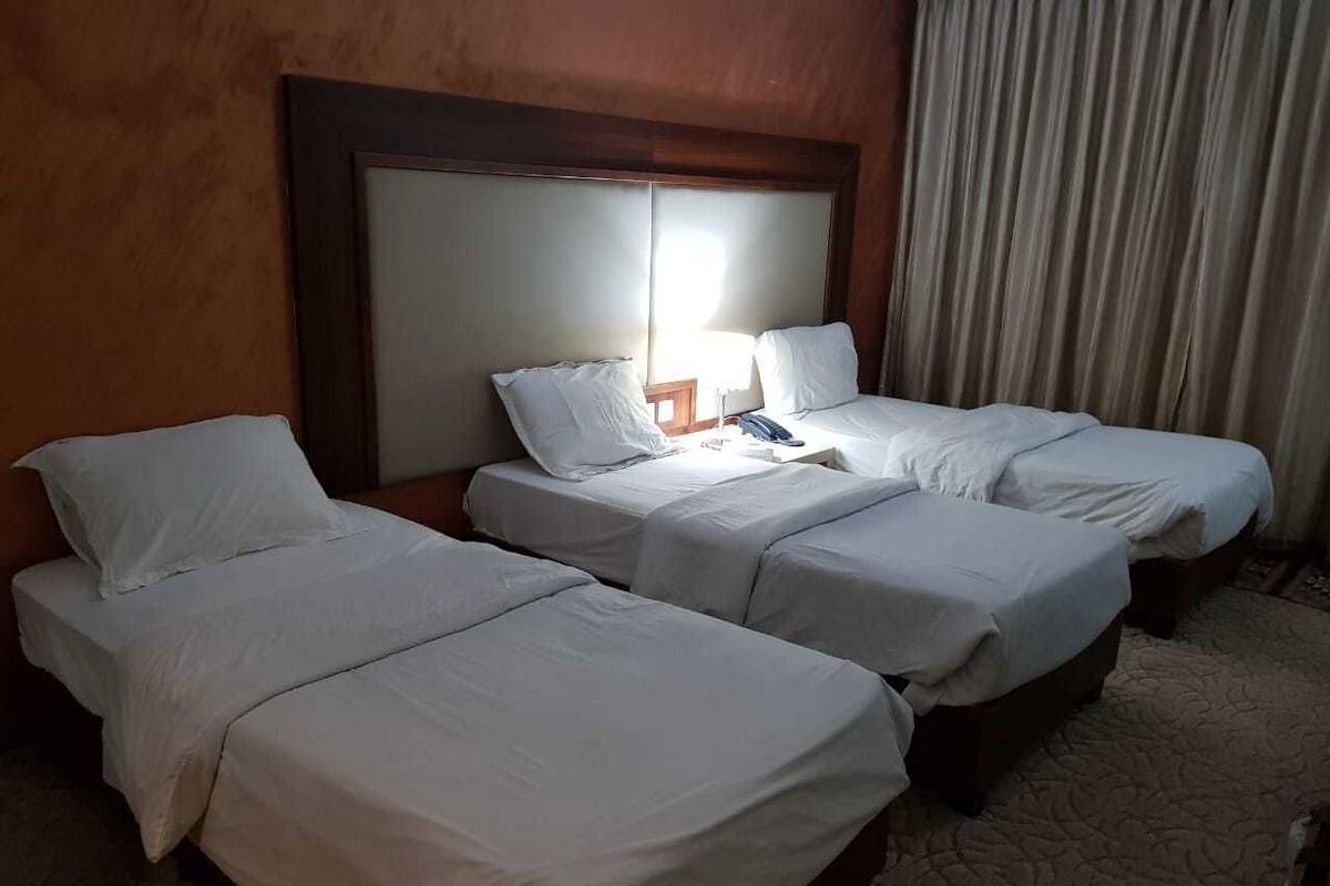 Triple Room | In-room safe, iron/ironing board, cribs (free)