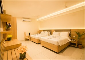 Chambre Quadruple Deluxe, plusieurs lits