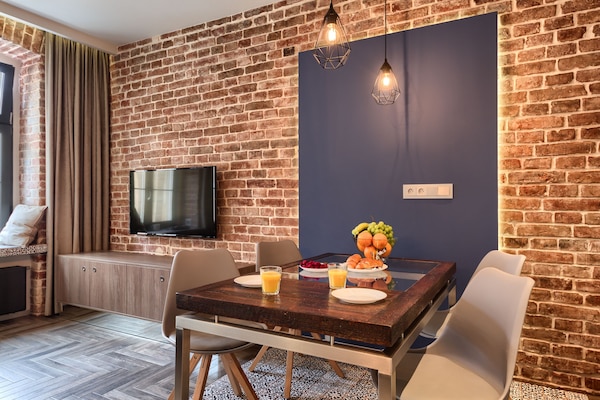 Deluxe Suite, 1 Queen Bed with Sofa bed, City View | Living room | 42-inch flat-screen TV with cable channels, LED TV