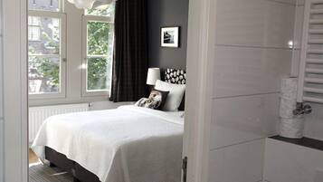 Deluxe Double Room, 1 King Bed, Canal View | Bathroom | Shower, hair dryer, towels, soap