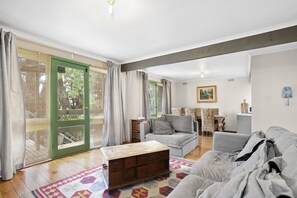 Flat-screen TV, fireplace, DVD player, stereo