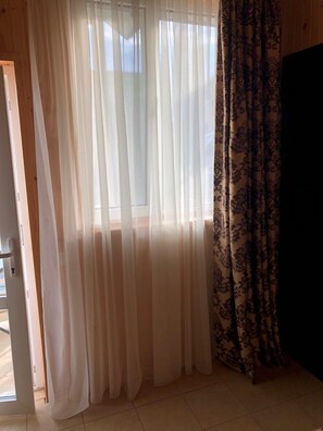 Standard Double Room, Resort View | In-room safe, individually decorated, desk, blackout drapes