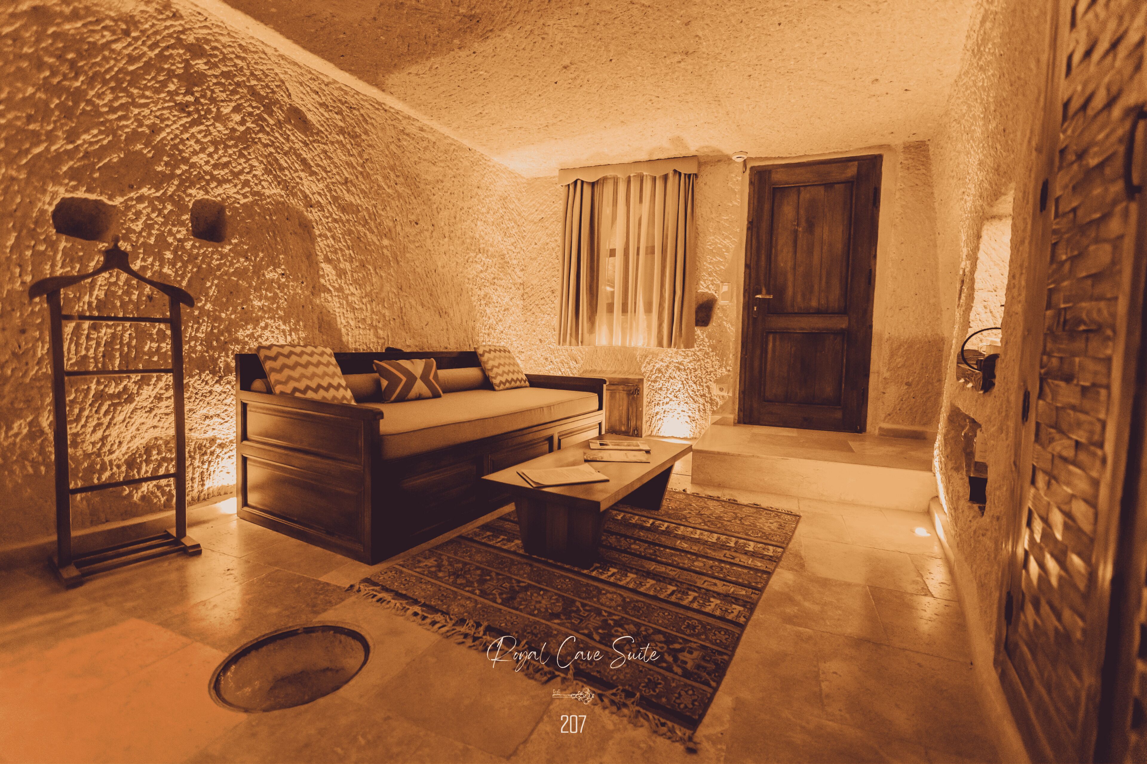royal cave suite | living area | lcd tv