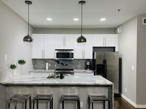 Fridge, microwave, dishwasher, coffee/tea maker