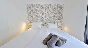 2 dormitorios, tabla de planchar con plancha, wifi gratis y ropa de cama
