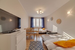 Design Apartment | Living area | 42-inch flat-screen TV with premium channels, Smart TV - Dream Loft Krosna (Gdansk)