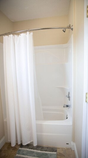 Shower, towels, soap, toilet paper
