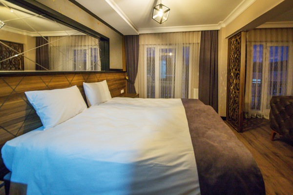 Tremannsrom – deluxe | Minibar, wi-fi (inkludert) og sengetøy