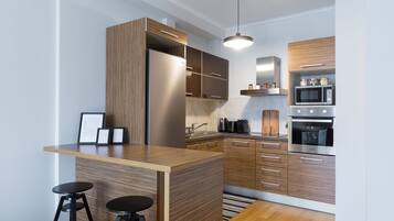 Apartment | Living area | 43-inch flat-screen TV with satellite channels, Smart TV, Netflix